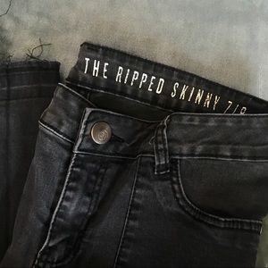 Slightly Cropped Black Ripped Skinny Jeans